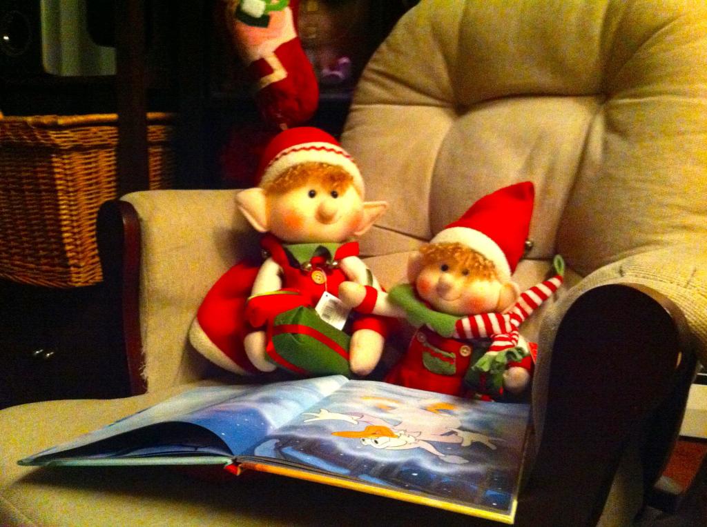 Gingerbread Being Read to By His Mommy Elf!