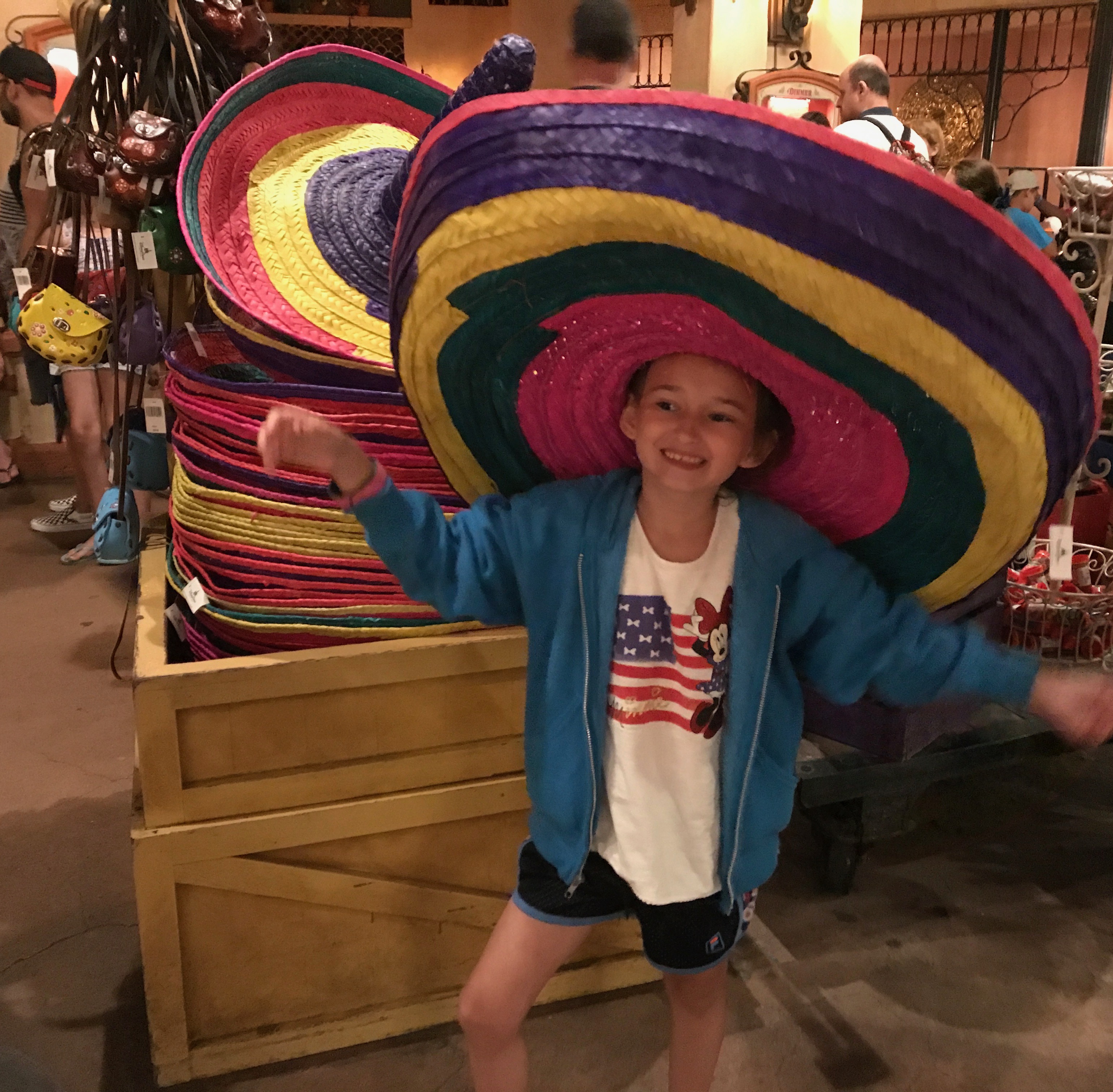 Shopping at Epcot in The Mexican Market wearing a Sombrero