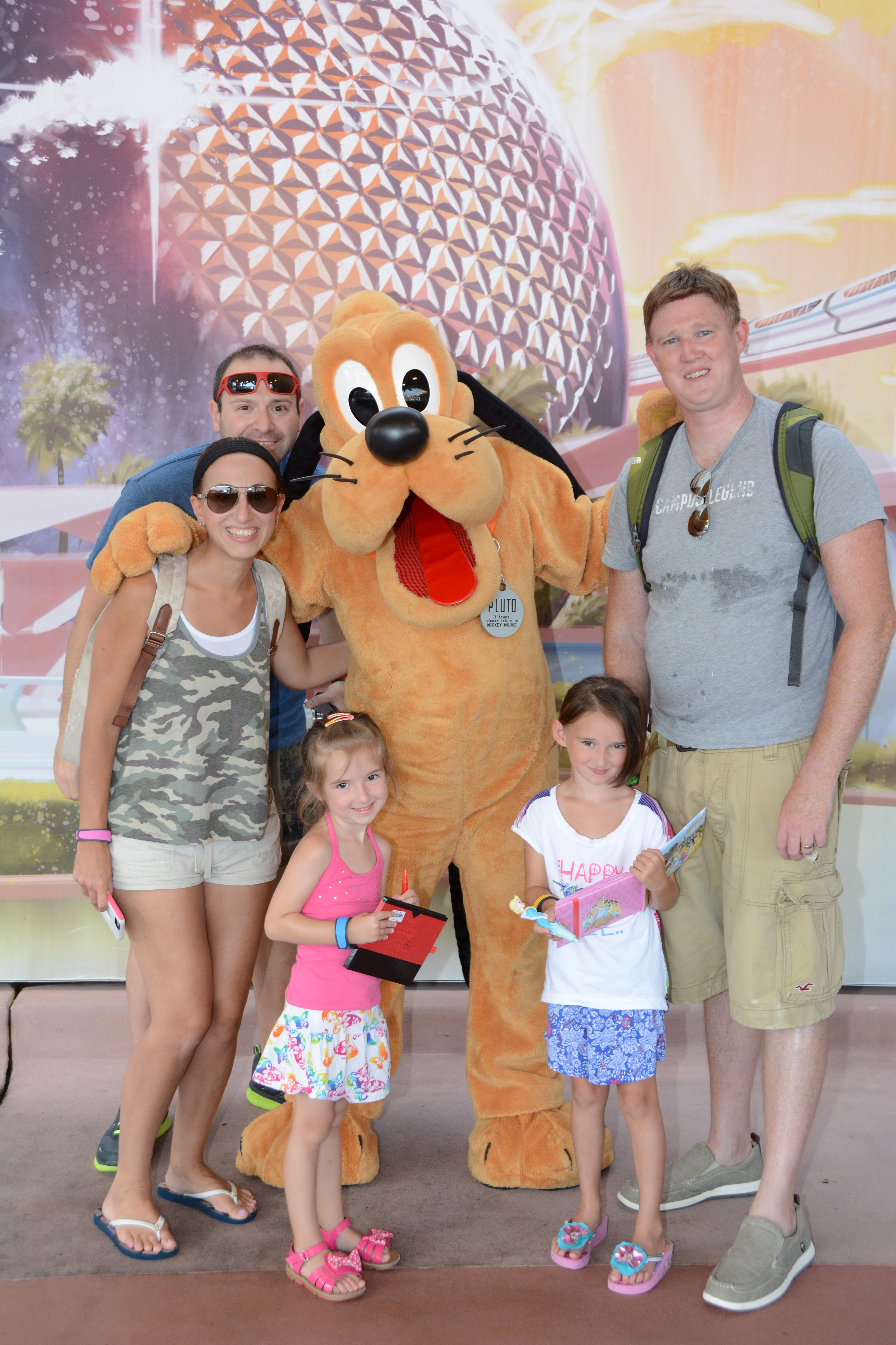 Meeting Pluto at Disney's Epcot with Backpacks On