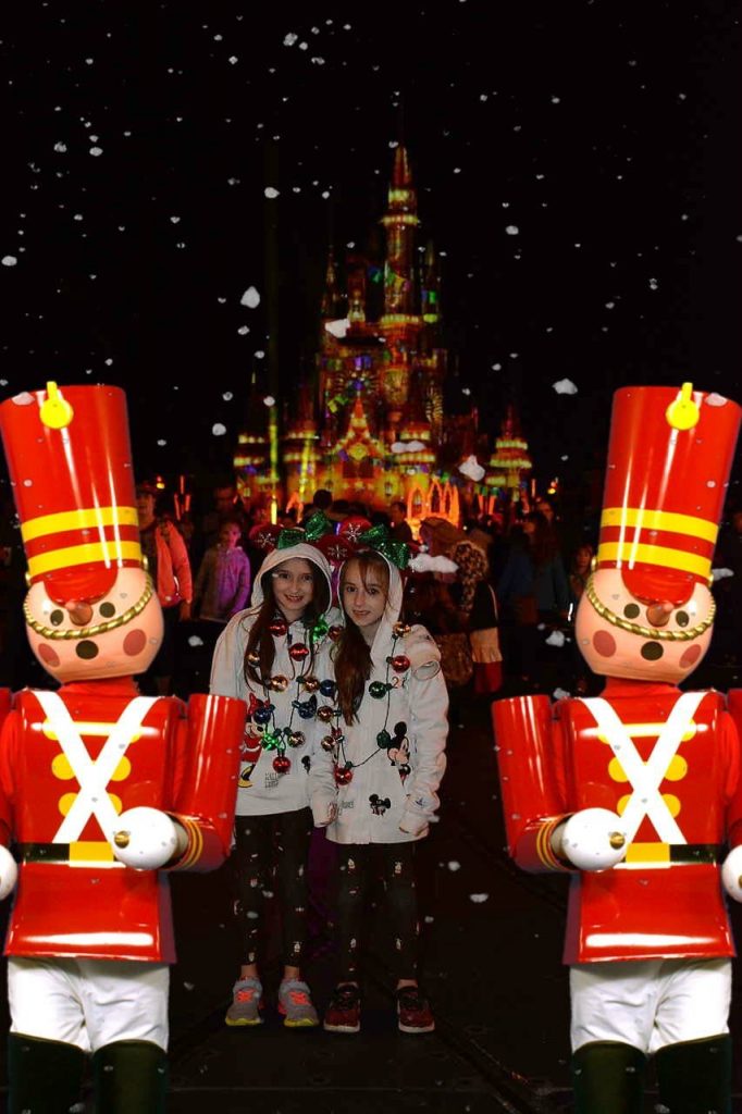 Mickeys Very Merry Christmas Party in Front of Castle with Wooden Soldiers