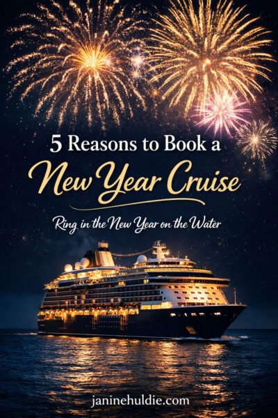 Fireworks over a cruise ship at night celebrating a New Year cruise at sea